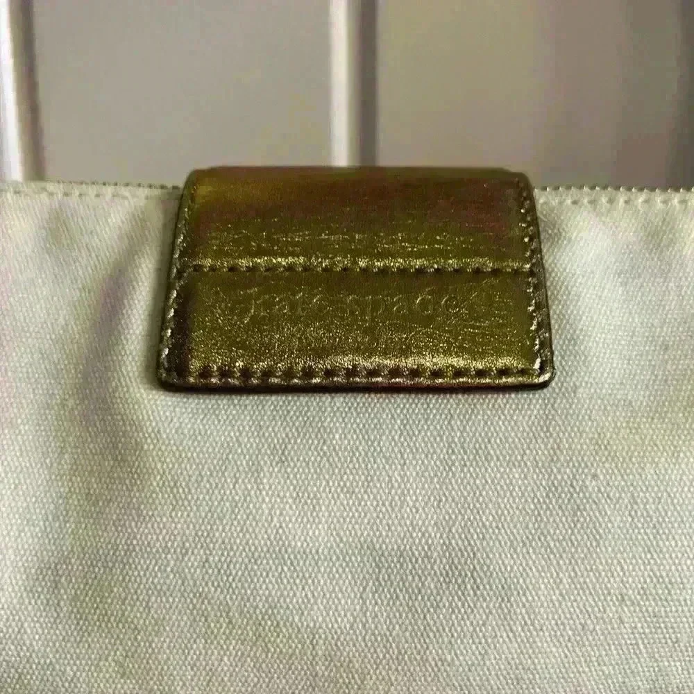 Kate Spade canvas and leather baguette bag
